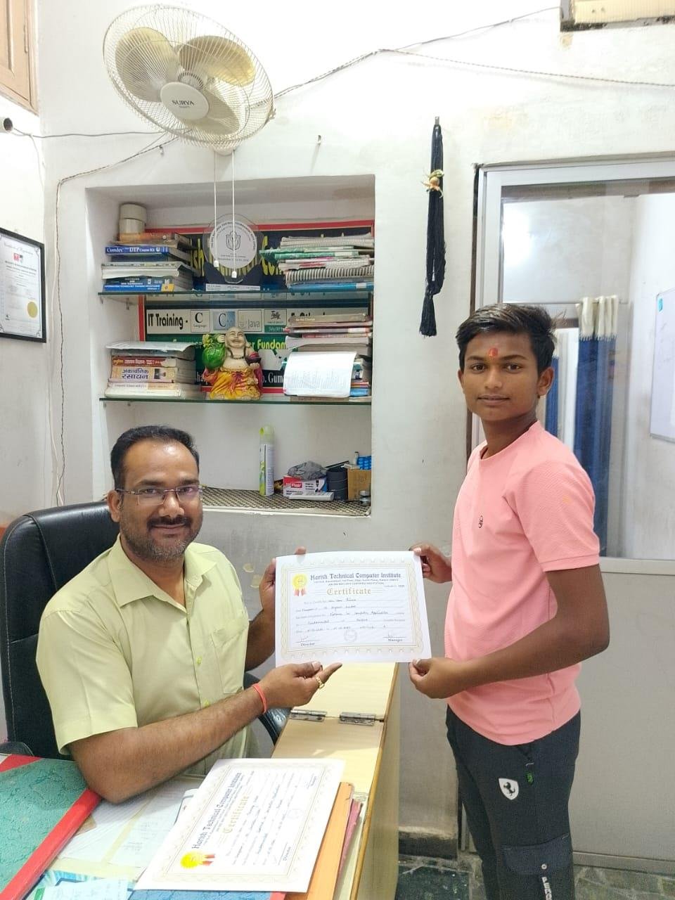 Student receiving certificate